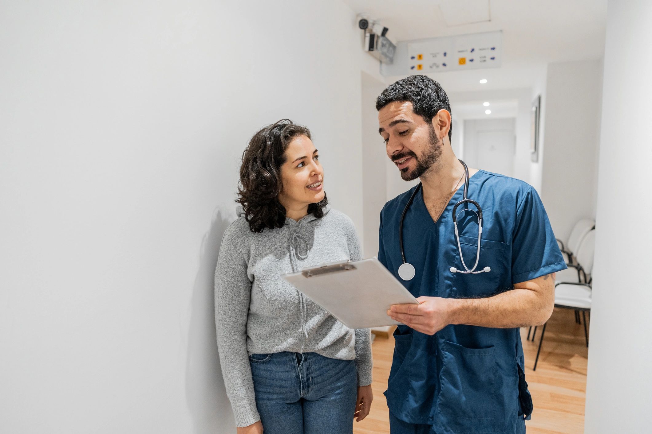 Clinician reviewing information with a patient